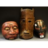 An Indonesian hardwood mask;