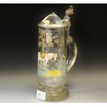 A 19th Century glass stein painted with a white horse in full tack