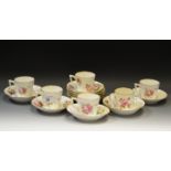 A set of six Sampson Hancock coffee cups and saucers;