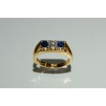 A sapphire and diamond trilogy ring,