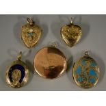 A Victorian 9ct gold front and backed circular locket; another; oval portrait locket,