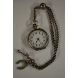 A George V continental silver lady's fob watch on chain, enamelled blue and white dial,