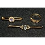 A Victorian amethyst and seed pearl floral centred bar brooch, 15ct gold mount, stamped 15,