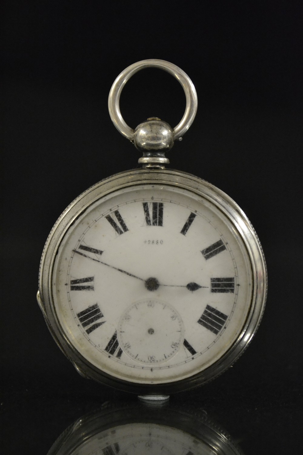 A continental fine silver open face pocket watch, white enamel dial, bold Roman numerals,