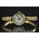 Rolex - a vintage ladys bracelet watch, silver sunburst dial, Arabic numerals, minute track,