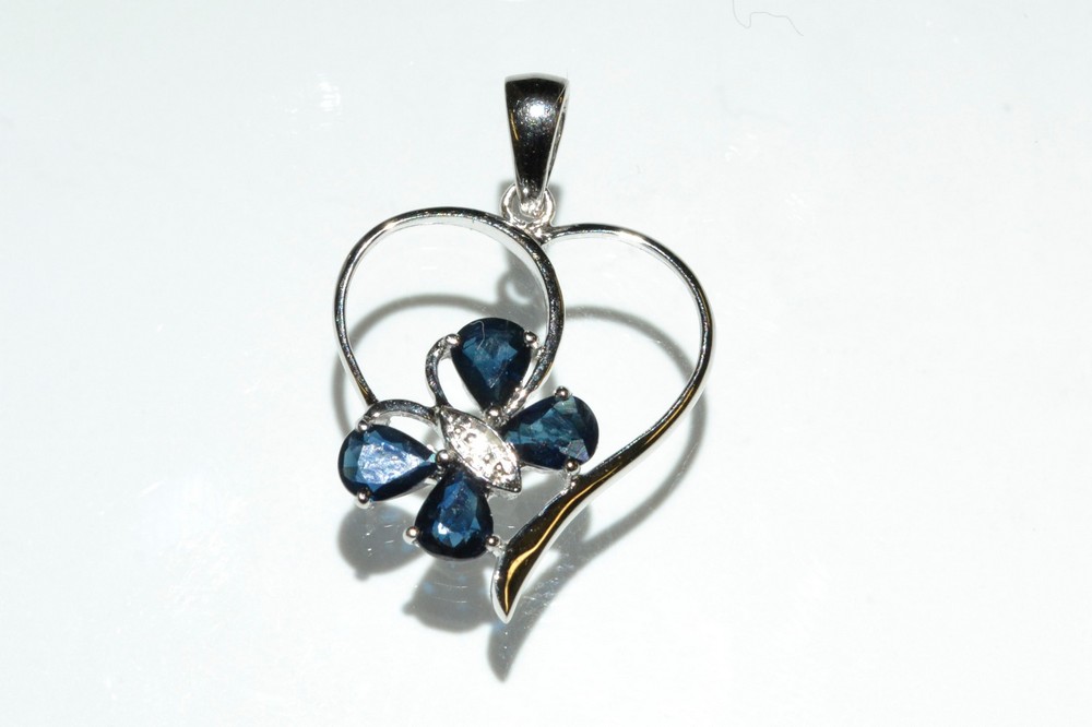 A sapphire and diamond butterfly heart pendant, 9ct white gold frame and mount, stamped 375,