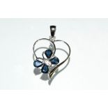 A sapphire and diamond butterfly heart pendant, 9ct white gold frame and mount, stamped 375,