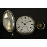 An Edwardian silver hunter pocket watch, white enamel dial, bold Roman numerals, minute track,