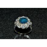 A fancy blue green and white diamond floral cluster ring,