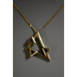 A modern triangular pendant, open body mounted to each side with a single triangular amethyst,