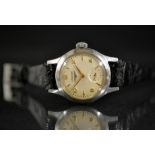 Longines - a 1950s lady's stainless steel cased wristwatch, cream dial,