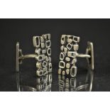 A pair of Modernist 9s5 silver open cast free form pebble panel cufflinks, stamped 925, 35.