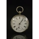 A Victorian silver open face pocket watch, white enamel dial, bold Roman numerals, minute track,