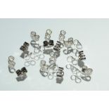 Ten pairs of 9ct white gold butterfly earring backs,