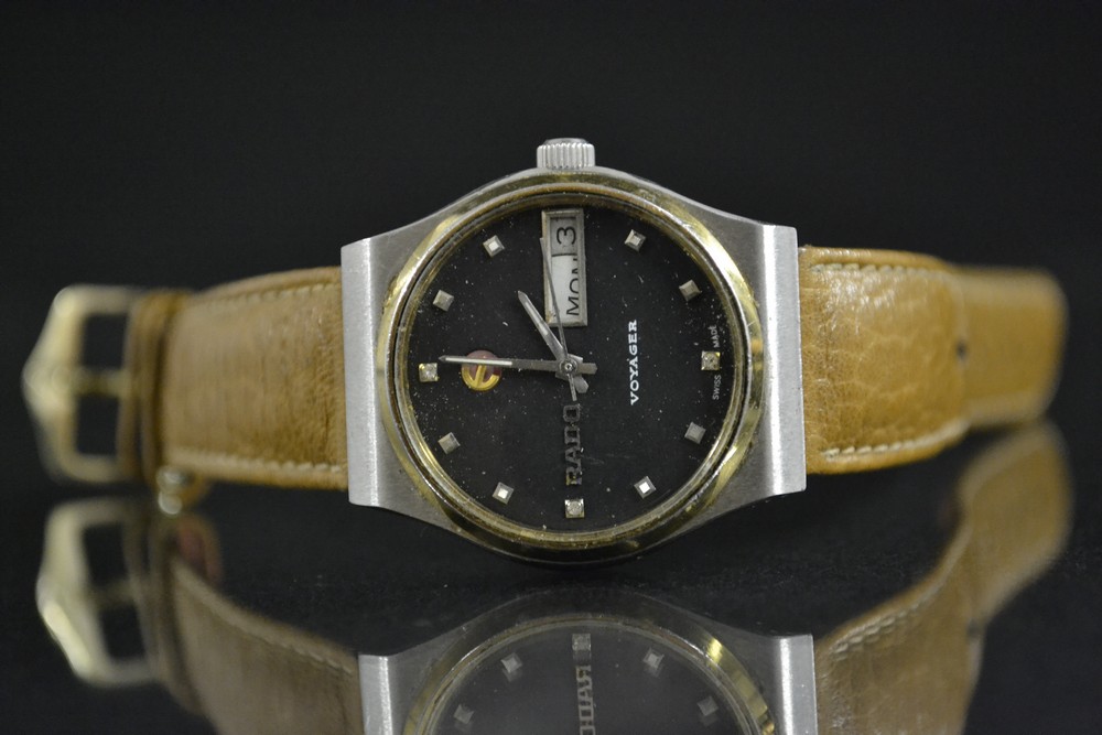 Rado - a Retro Rado 1980s Voyager wristwatch, black dial, stone and box pyramid batons,