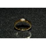 A diamond solitaire ring, round brilliant cut diamond twin pillar crown,