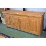 A modern light oak sideboard, rectangular top,