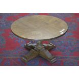 An oak circular coffee table,