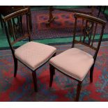 A pair of Edwardian mahogany inlaid salon chairs C1910