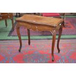 A 19th century mahogany serpentine card table,