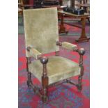 A French oak open armchair, padded back, turned arms with ball terminals, padded-over seat,