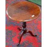 A Victorian mahogany tripod occasional table, moulded circular tilting-top, baluster column,