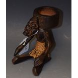 Tribal Art - an African hardwood figure, of a kneeling tribesman,