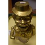 A jolly gentleman brass mechanical money bank