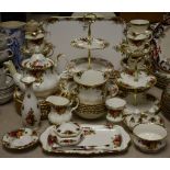 A Royal Albert Old Country Roses pattern dinner and tea service, comprising teapot, milk and sugar,