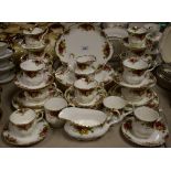 A Royal Albert Old Country Roses pattern dinner and tea service, comprising cups and saucers,