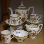 A Coalport Persian Flower pattern six setting coffee set, comprising coffee pot (faults), milk jug,