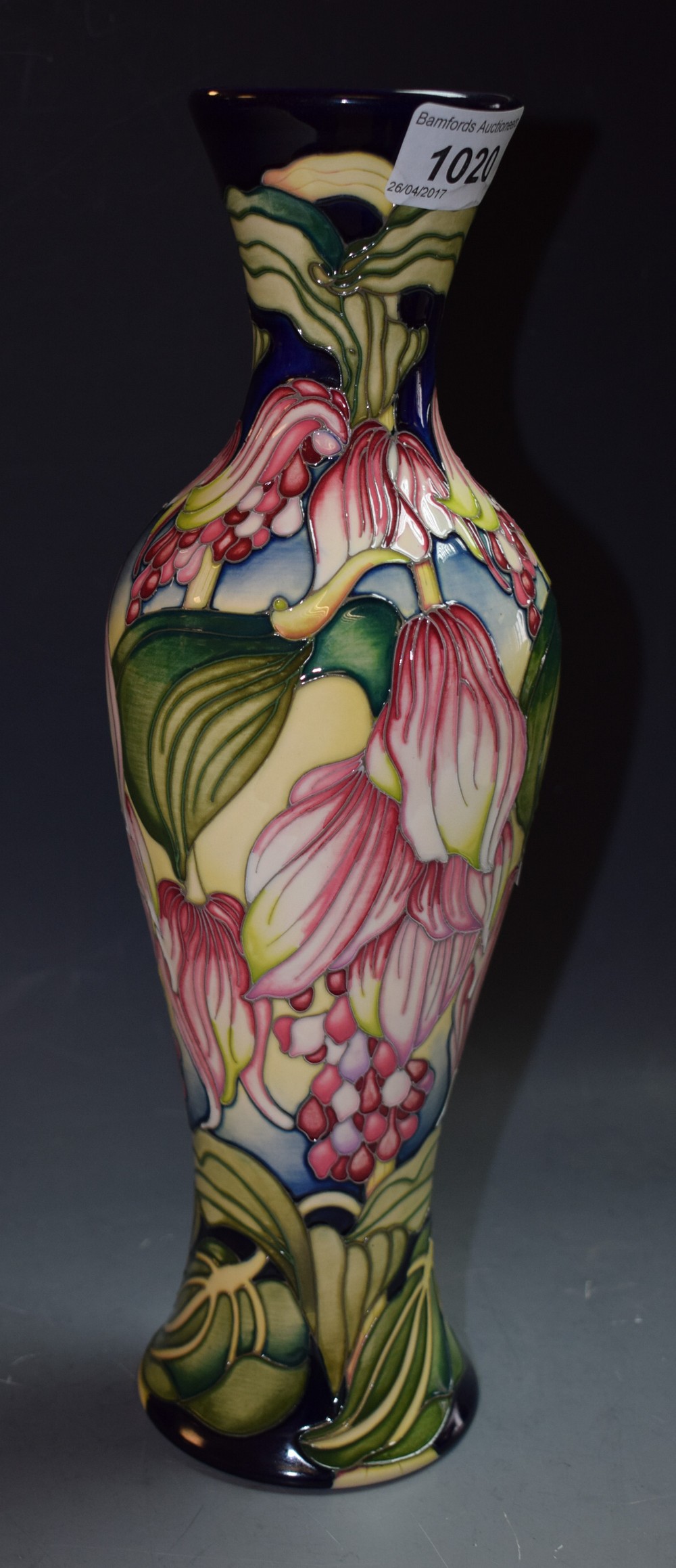 Moorcroft - a floral design baluster vase,