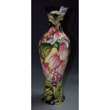 Moorcroft - a floral design baluster vase,