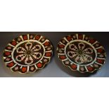 A pair of Royal Crown Derby 1128 circular wavy edge plates,