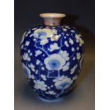 A Japanese ovoid vase, decorated in underglaze blue with cherry blossom,