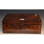 A Victorian flame mahogany and rosewood writing box