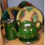 Three Whieldon type plates, one a strawberry plate; a green glazed teapot and stand,