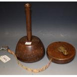 A 19th century wooden mallet; leather cased Rabone & Sons tape measure,