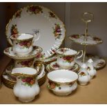 A Royal Albert Old Country Rose pattern part table service, including two tier cake stand,