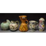 A Wade Heath Flaxware jug; a Poole vase; a Denby Glynware jug;