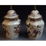 A pair of Mason's Blue Mandalay pattern octagonal pagoda ginger jars and covers