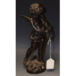 A bronze winged cherub holding tambourine