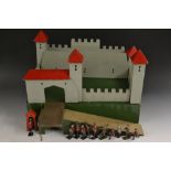 Toys and Juvenalia - a wooden fort with painted grey fortifications.