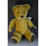 An Irish Tara mohair Teddy Bear, golden mohair body, glass eyes, stitched nose, rexine pads,