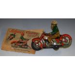 Schuco (Germany) tinplate and clockwork Curvo 1000 motorcyclist, red motorcycle,