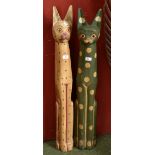 Two modern Indonesian carved wooden cats.