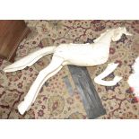A wooden white painted horse.
