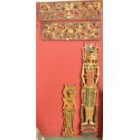 Two Indonesian decorative carved wood friezes; two panels carved as figures.