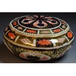 Royal Crown Derby - an 1128 pattern circular lidded box, 1919 cypher, lobed lid,