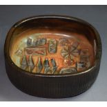 A Studio Pottery terracotta rounded square dish,